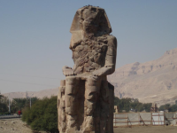 One of a pair of 30-meter (50-ft) statues of Amenhotep III in the Theban Necropolis